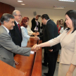 Saludo final en la Sala de Conferencias de la sede judicial de la capital.